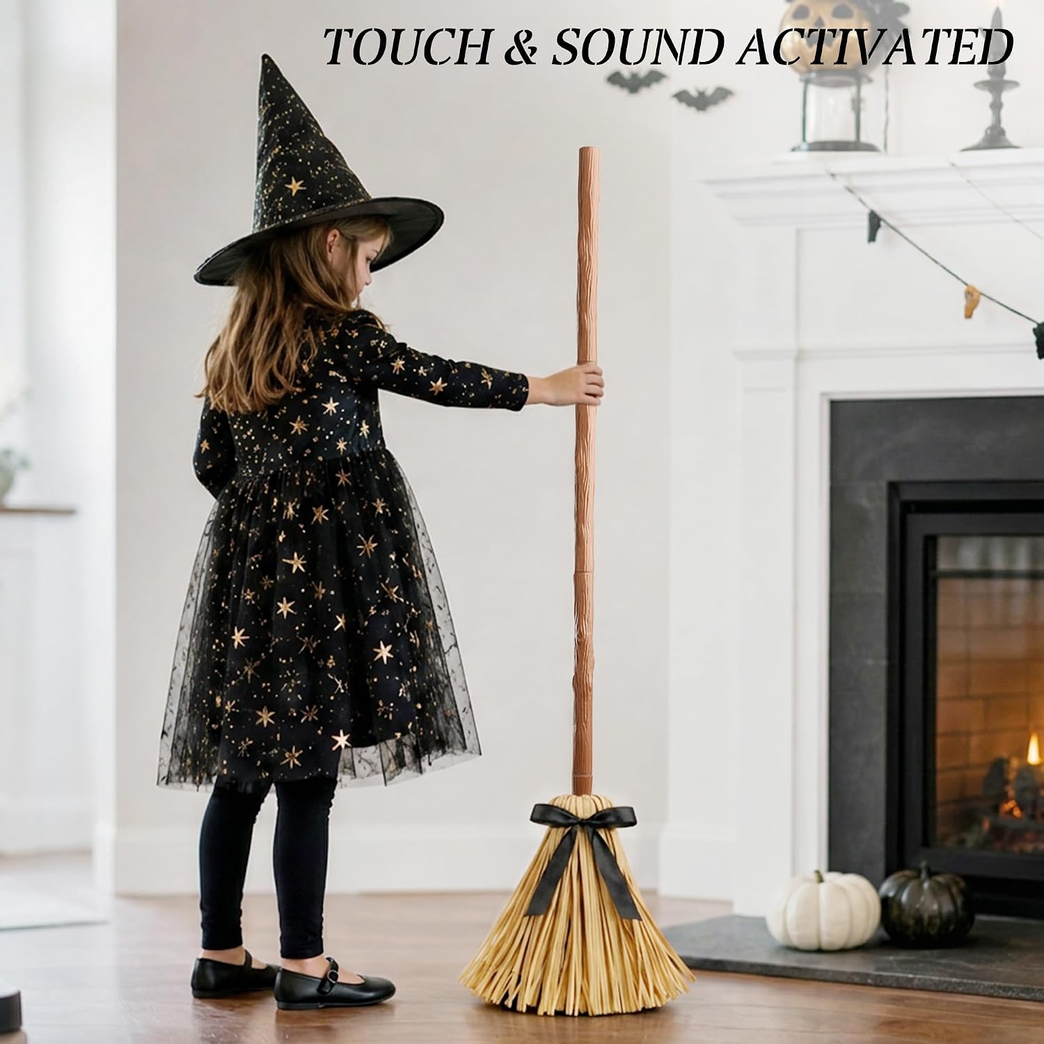 Touch and sound activated witch broom with a child in a witch costume